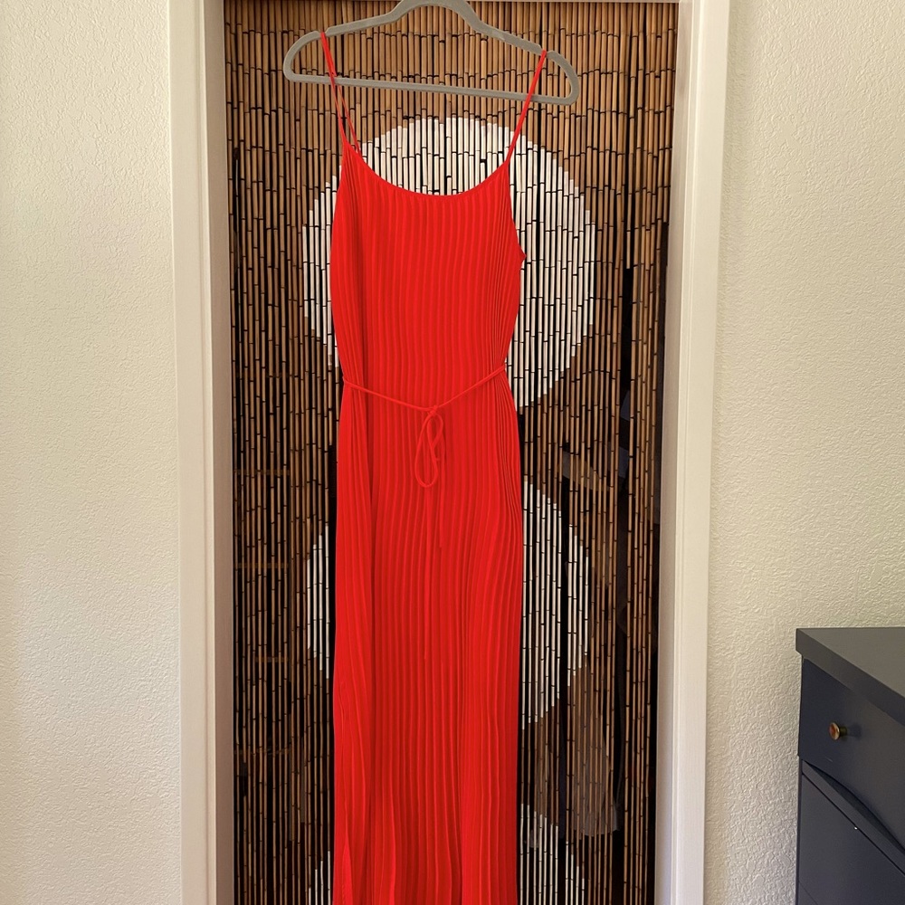Flowy red pleated dress